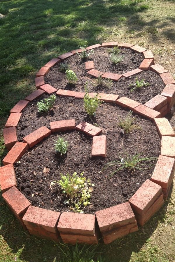 1. Create Spiral Herb Garden Bed From Bricks
